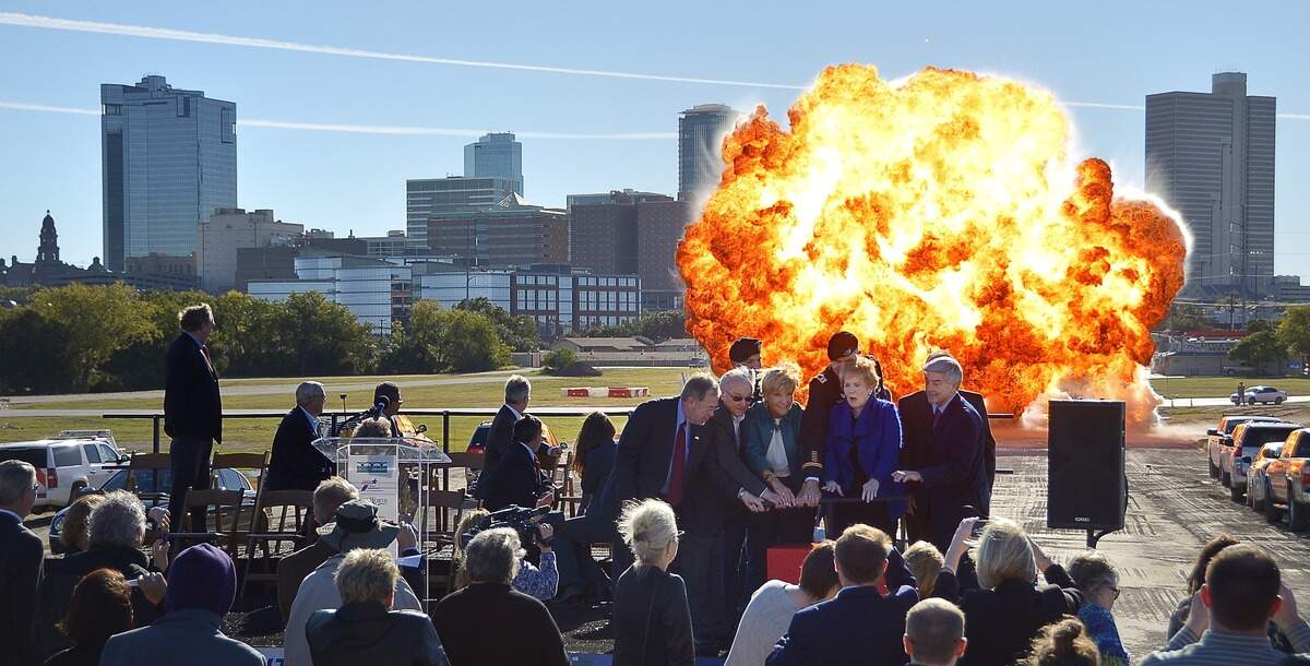 Officials detonate a blast on Henderson Street at the official groundbreaking of construction of the Panther Island Bridges being built on Henderson Street, North Main Street and White Settlement in Fort Worth, TX, Monday, Nov. 10, 2014.  The ceremony included remarks by Congresswoman Kay Granger, Texas Department of Transportation Commissioner Victor Vandergriff and Fort Worth Mayor Betsy Price.